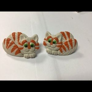 Orange and white clay cat